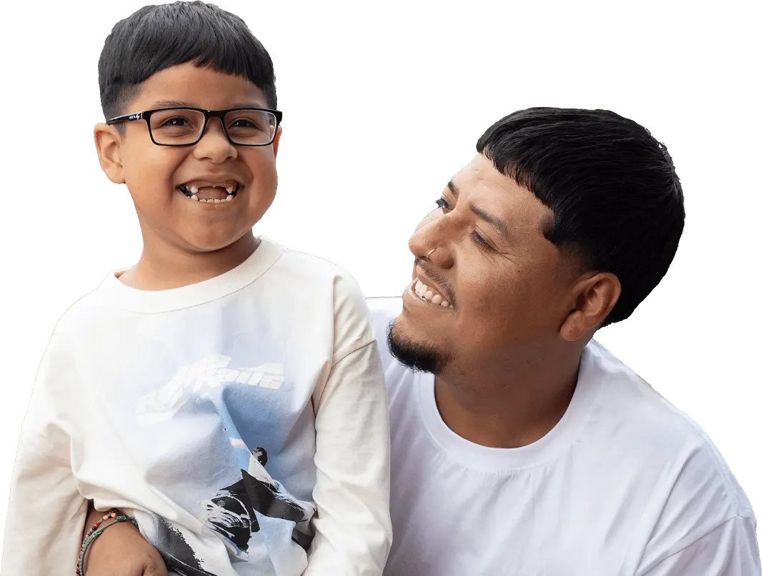 Diego and his father smiling together
