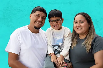 Diego and his family smiling together