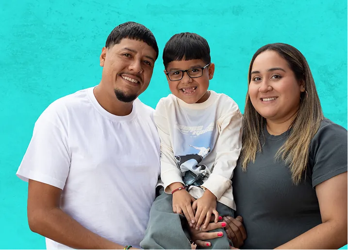 Diego and his family smiling together