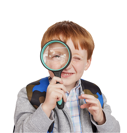 Emmett looking through a magnifying glass