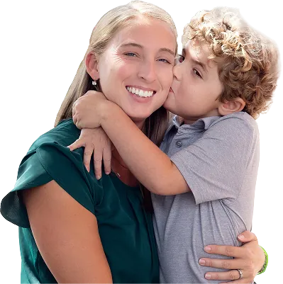 Tripp kissing his mother on the cheek