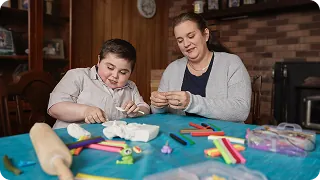 Brantley doing an arts and crafts activity with his mother
